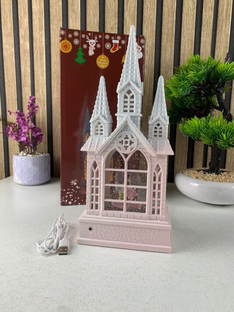 Château à Neige Lumineux avec Paillettes Tourbillonnantes – Magie et Élégance